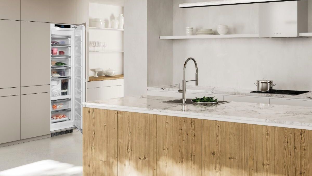 You're planning your dream #kitchen. With #Liebherr, get a top-notch freezer with IceMaker for 8kg of ice cubes, smooth-sliding drawer, and NoFrost technology, eliminating the need for #defrosting.