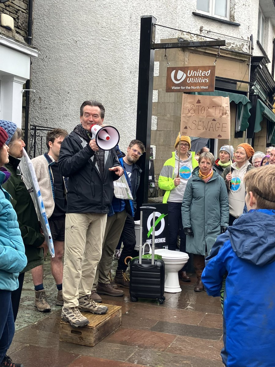 Locals in Windermere are out in full force to protest against sewage dumps leading to England’s largest lake. Feargal Sharkey and Tim Farron MP among dozens of protesters outside United Utilities’ information centre.