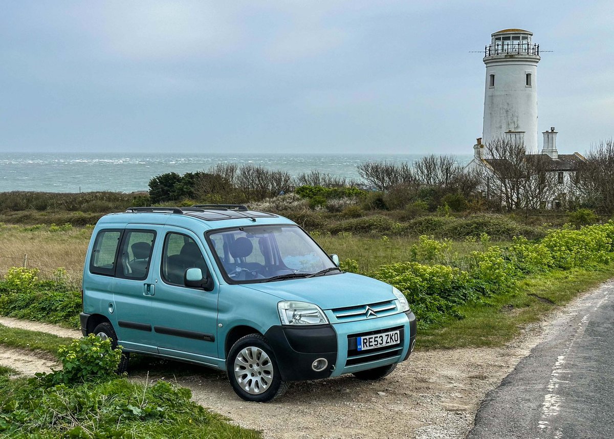 Dithering around Dorset lighthouses in a £500 mini-camper disguised as an old French van with windows.