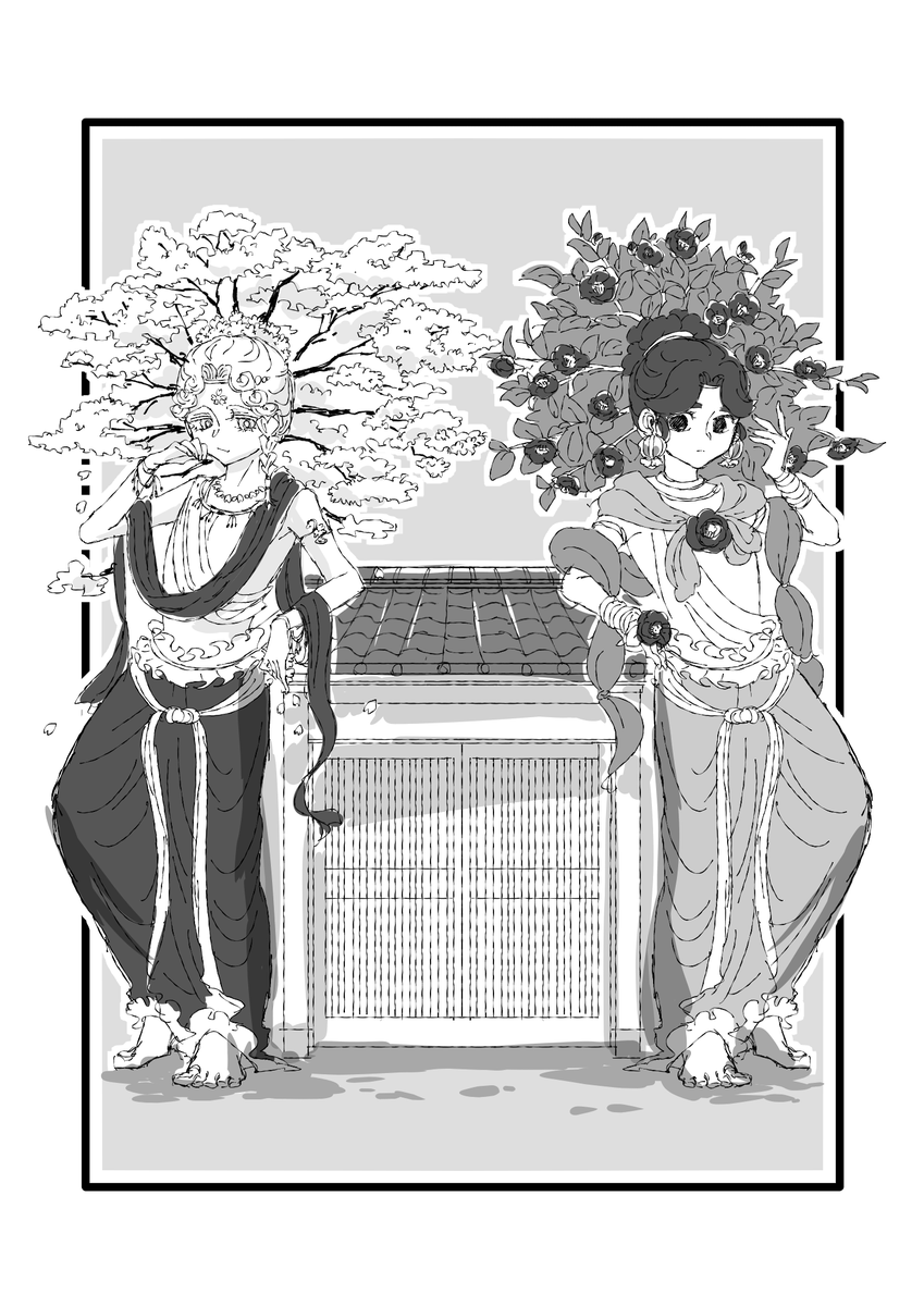 門のところに桜と椿を植えているお家があって、門番みたいだった 