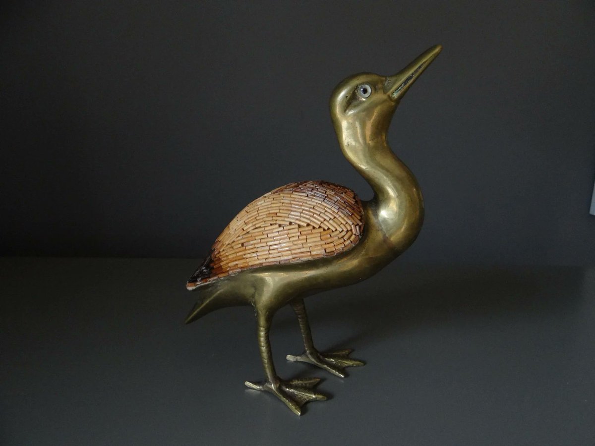 Vintage solid brass statue, duck with its beak raised with its wings covered in rushes, wild bird #homedecor #etsyfinds #vintage #onlineshopping #HomeStyle #DecorateWithArt #CreativeSpaces #elevateYourDecor #MothersDayGift #wiseshopper  
Available here
 elementsdeco.etsy.com/listing/744349…