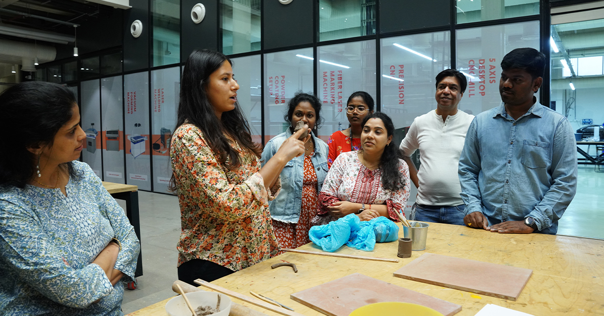 T-Works recently hosted 35 employees from DBS Bank for a team-building activity. They toured our facility and were inspired by the state-of-the-art machinery and systems. They also participated in a ceramic workshop, creating beautiful artwork. #tworks #innovation #teambuilding