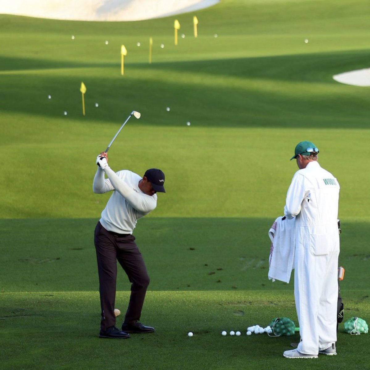 TWlegion's tweet photo. 🚨🌺⛳️ #MONDAY WORK — Tiger Woods is on the course bright and early at Augusta National to kick off Masters week. (📸: Andrew Redington / Getty) https://t.co/XvPKJqJebi
