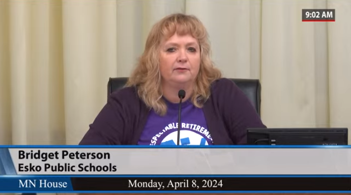 EducationMN's tweet photo. Esko educator Bridget Peterson testifies in support of legislation accelerating the NRA 65 for Tier 2 teachers to this year -- reminding them the work for equitable teacher pensions is far from over. "Educators need your help!" #mnleg #pensionequitynow #fairpensionsnow https://t.co/CDqJ6WCxHC