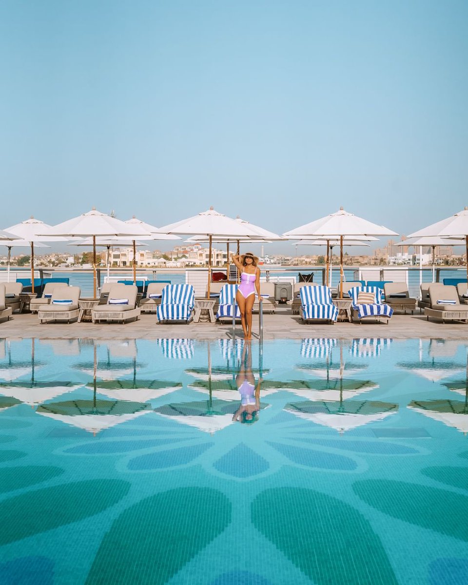Turquoise waters beckon at Taj Exotica, Resort & Spa, The Palm, Dubai. Sun-kissed days of summertime serenity are waiting at this oasis for the soul. #TajHotels #Tajness #ThePalmDubai