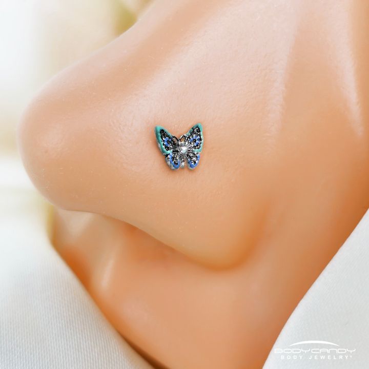 Catch me if you can... rocking this sweet butterfly nose ring! 🦋💖 bodycandy.com/products/20-ga…

#bodycandy #bodyjewelry #bodymods #piercings #nosering #nosepiercing