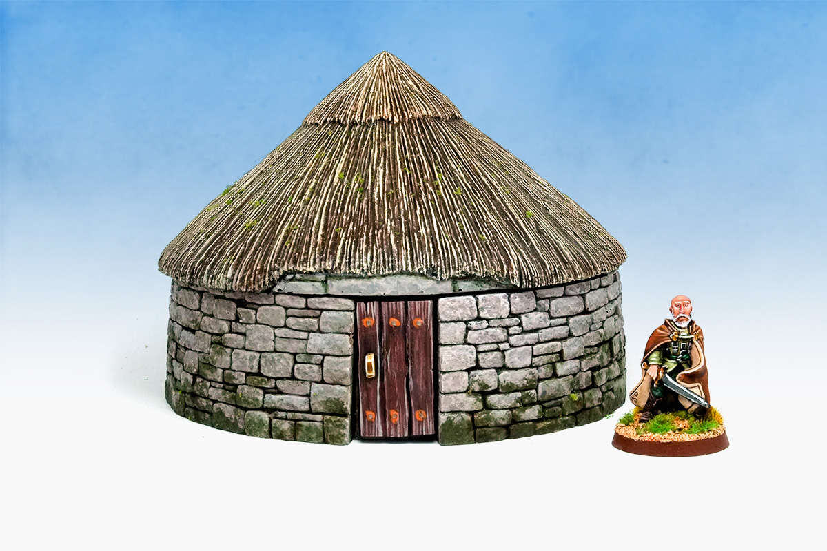 Stone Roundhouse? Round Stonehouse? In any case it's a perfect ancient/fantasy building for farmers or maybe insane magic users!