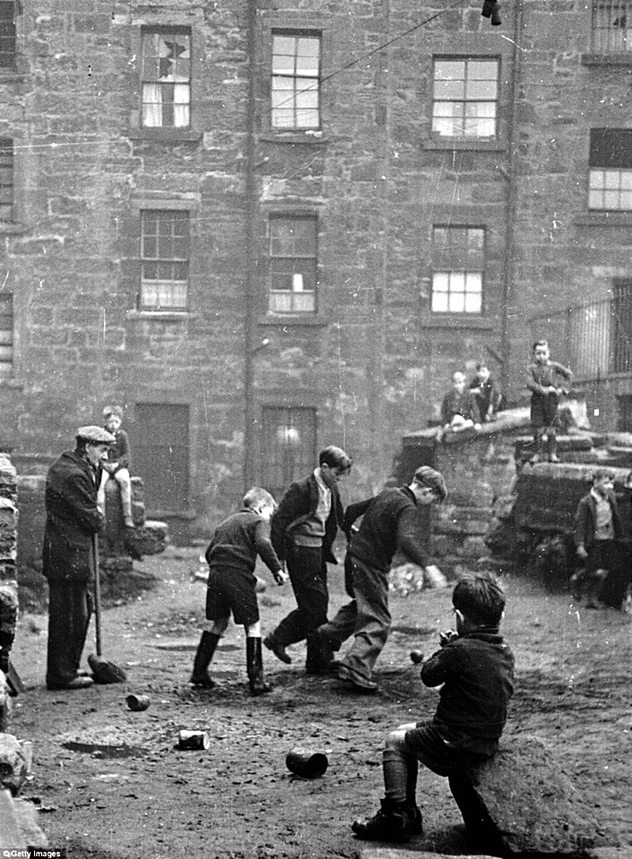 Bert Hardy - Youngsters enjoy a kickabout in Glasgow in 1948.