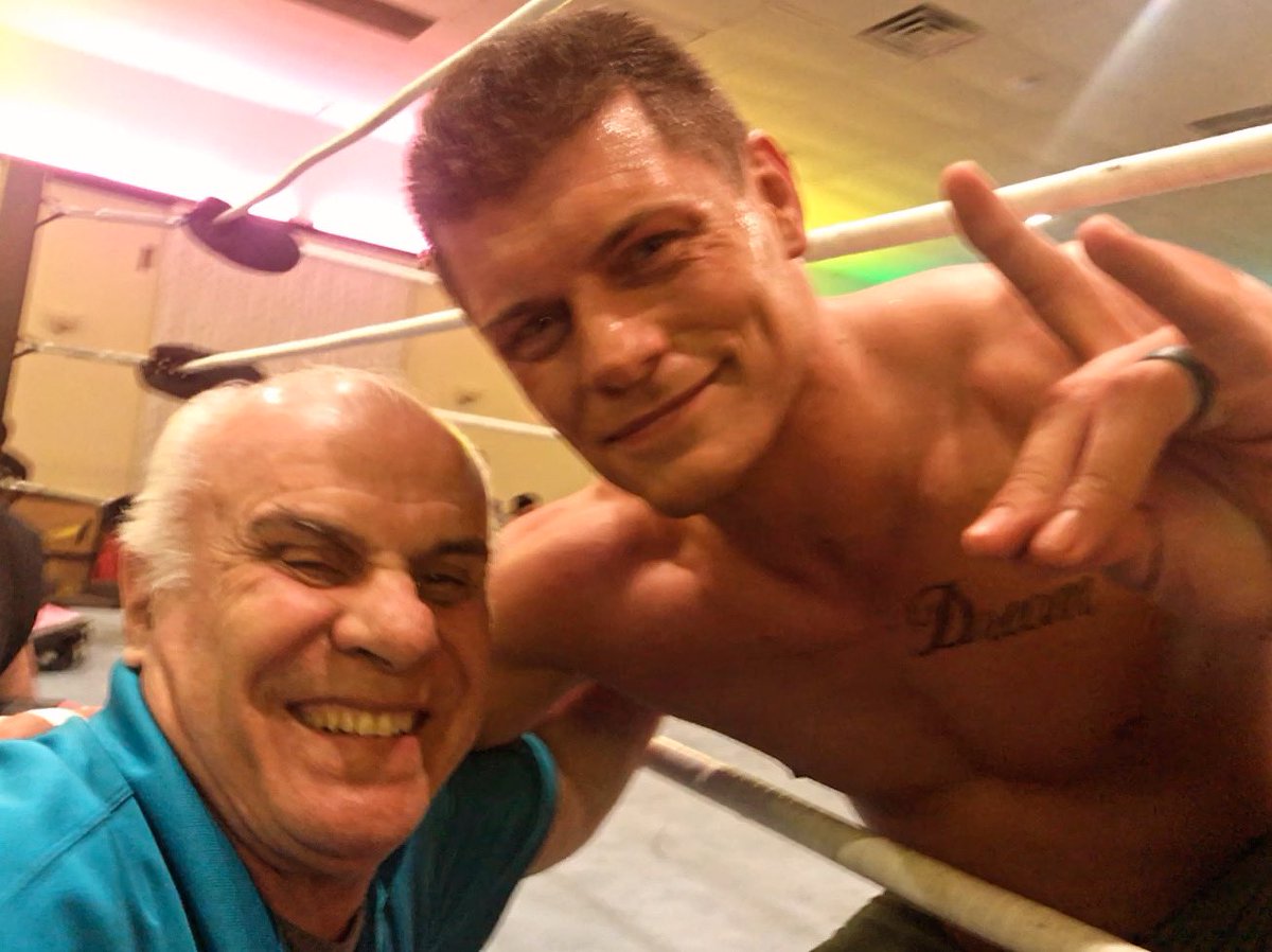 My dad works at a public school & all the kids are still talking about @CodyRhodes My 81 year old dad is the coolest guy at the school b/c hes showing off this picture Dusty was his favorite wrestler, so when Cody was doing the local runs I took him to see him. look at that smile