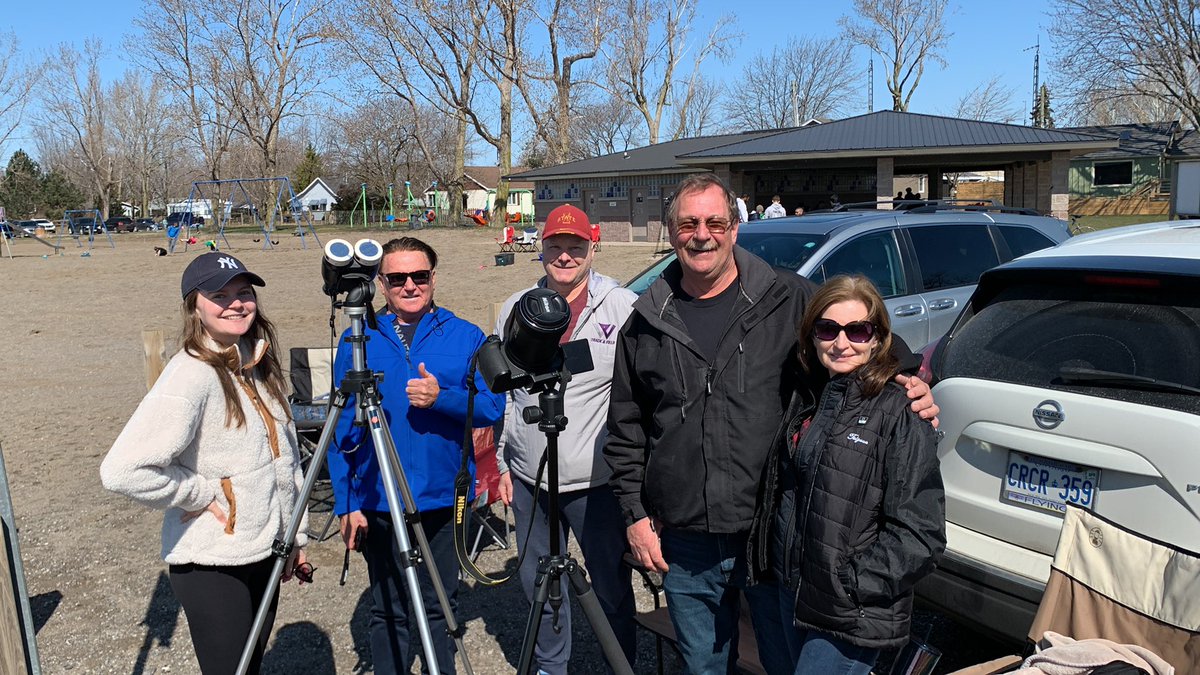 Ashley Burton, of Chatham, Richard Burton, of London, Trevor Hall, of Point Edward, and Jim and Monica Hereygers of Chatham are at Erieau ready to see the eclipse. #ckont