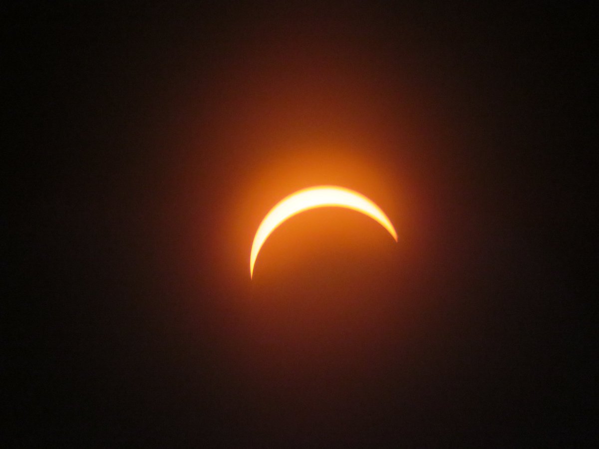johnage's tweet image. My humble attempts at trying to catch the solar eclipse from Montréal. We were lucky enough that from our backyard, we were in the path of totality. Such a surreal, and beautiful moment.