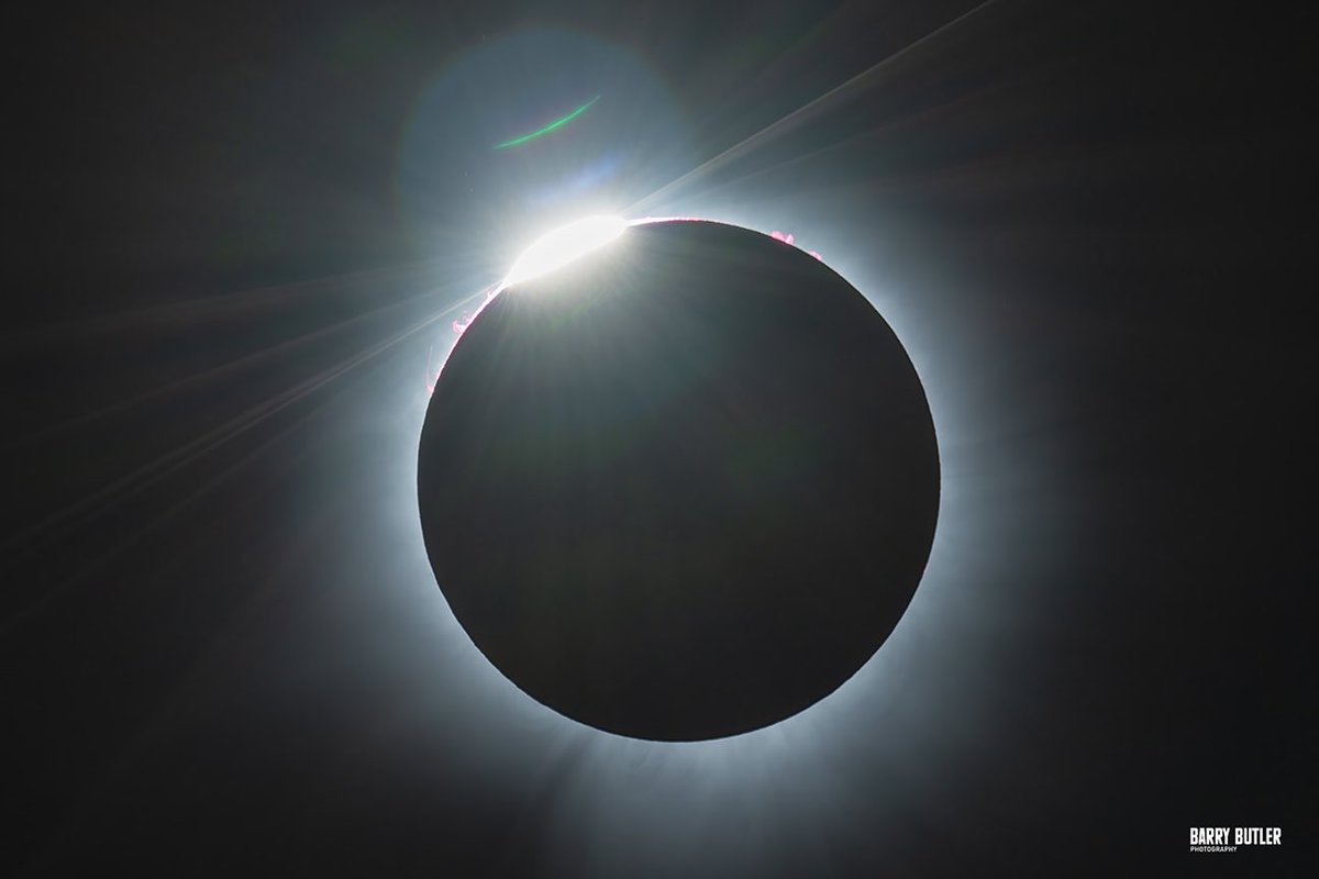 As the eclipse goes into totality, a diamond ring emerges. Over Jackson, Missouri.