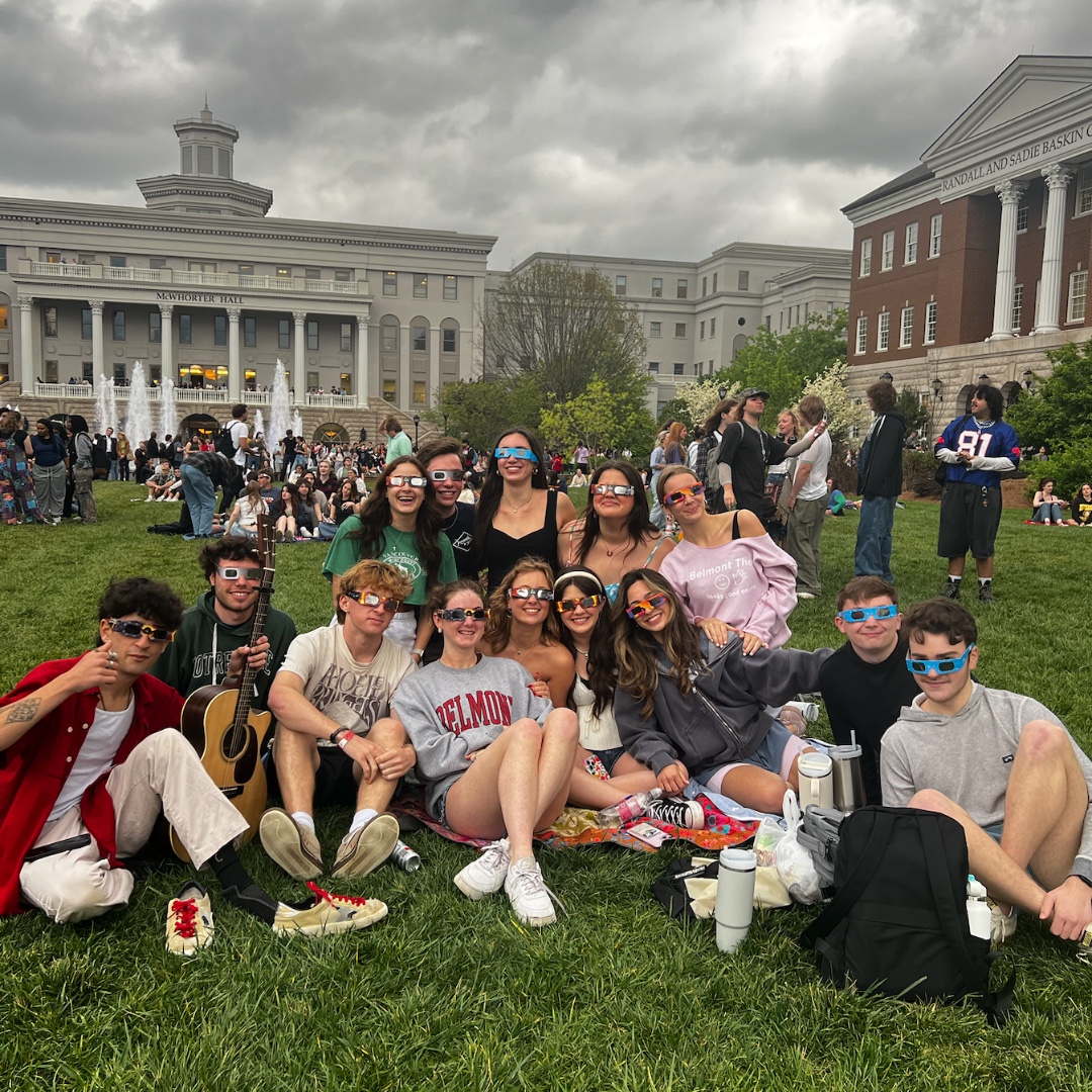 Taking a break from textbooks to marvel at the Eclipse on the lawn! 😎 🌔