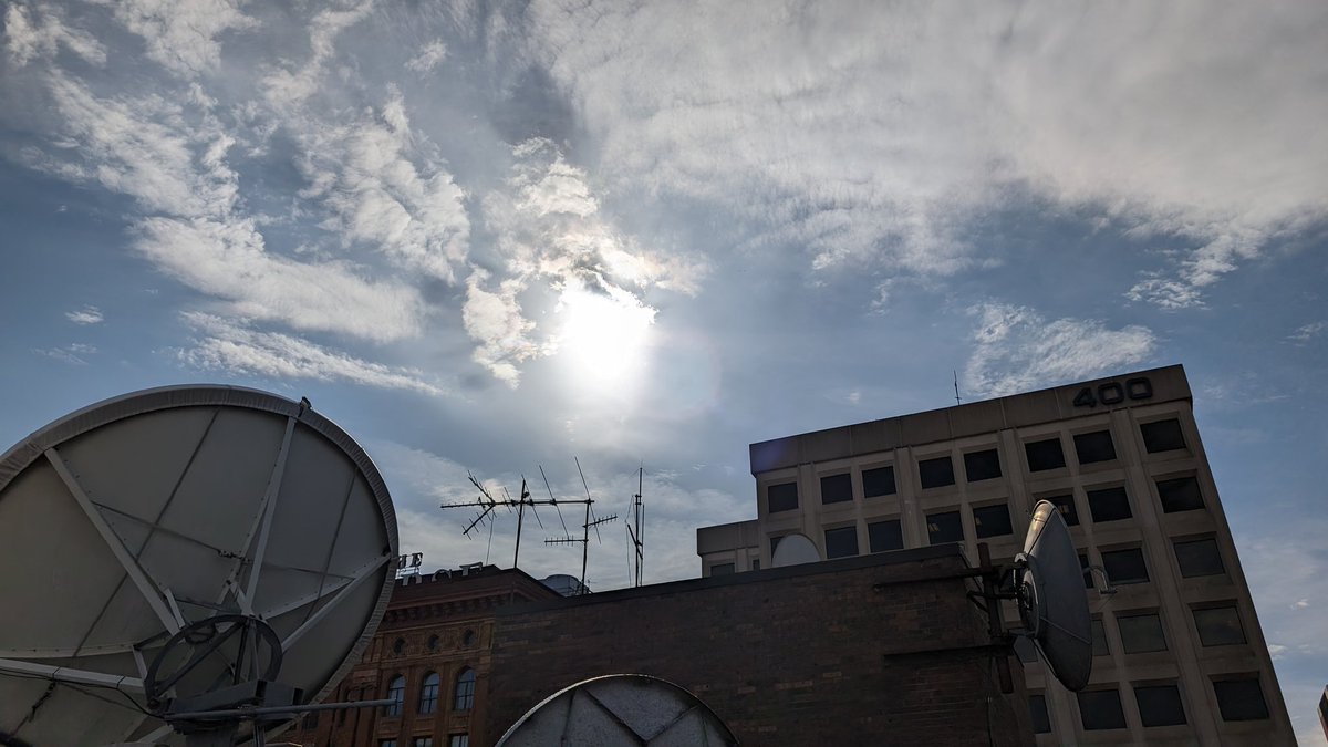 Just a tiny bit of the eclipse left at 4:30 PM. Almost back to normal over Phillllllly.