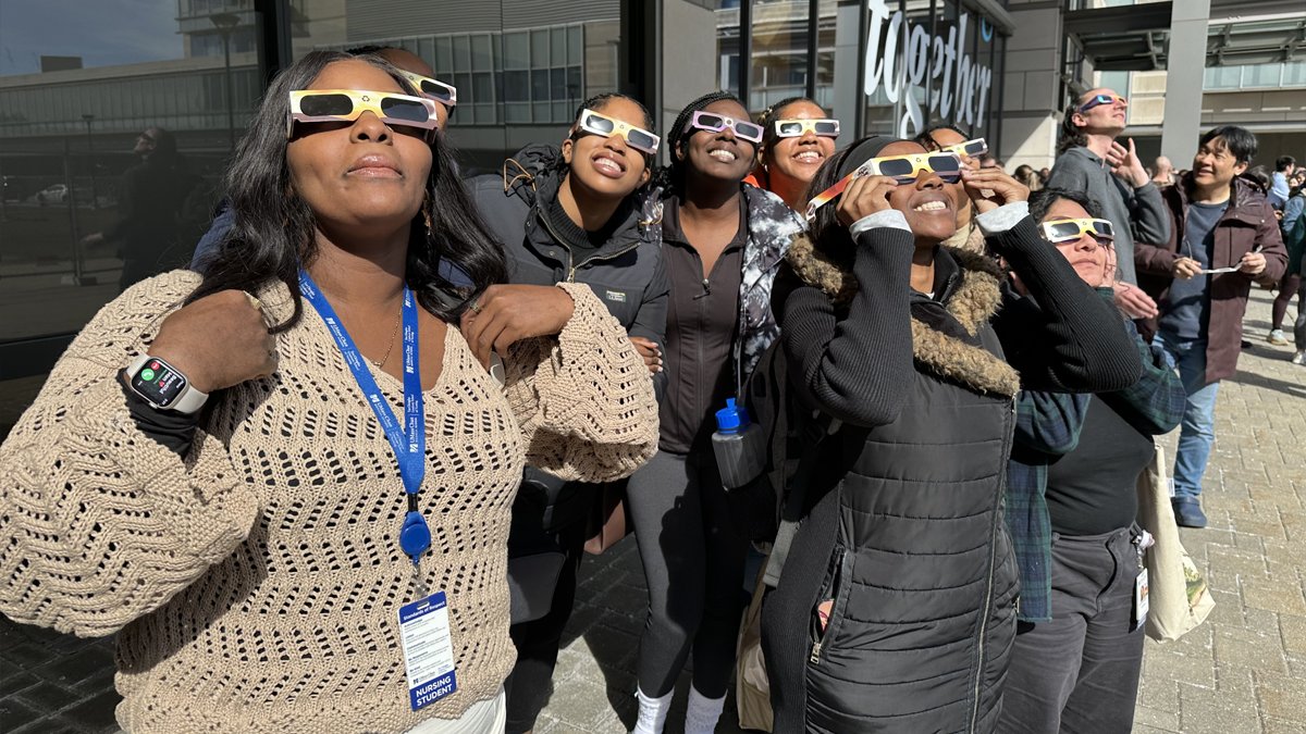 Nursing students at UMass Chan Medical School were among those who gathered outside the Medical School Building to watch the solar eclipse. Sabrina Webb, a first-year in the Graduate Entry Pathway Program, took the #eclipse photo. 🕶️ 🌘 #Eclipse2024 #EclipseSolar2024 #Worcester