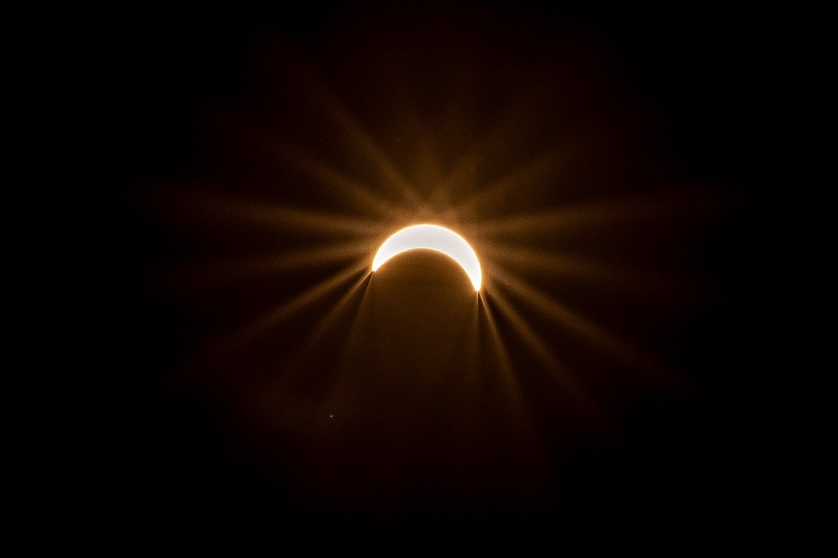 Eclipse from today but we weren’t in the totality path in KC. 135 prime giving some interesting specular flare. Settings were ridiculous because of no filter and just goofing off. Many others took this seriously and will produce great pics. This is not one of them. 😂