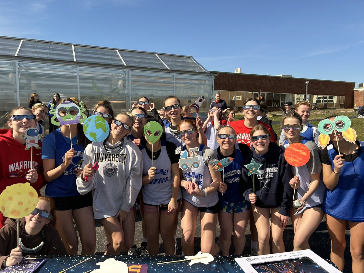 Winnacunnet's tweet photo. Our amazing Astronomy and Science Clubs joined forces to host a viewing of today's solar eclipse!  Students got a safe glimpse of this celestial phenomenon thanks to special eclipse glasses and the clubs' expertise.  What a fantastic way to explore the wonders of space! https://t.co/XVK2uG2yt7