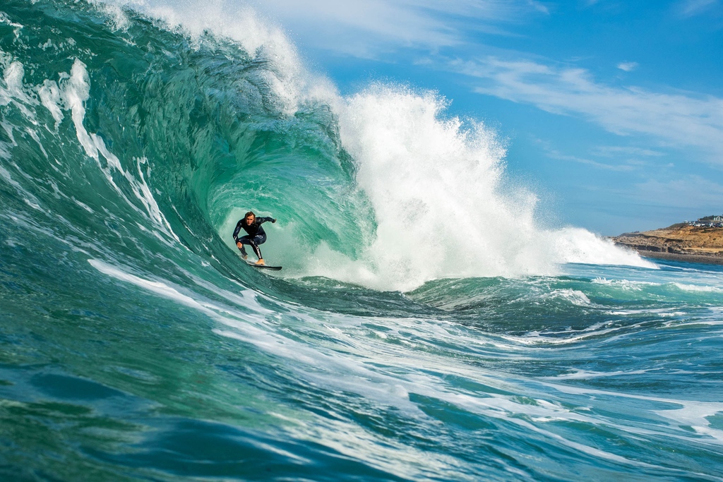 Torrey Meister, Portugal. 'This was way lower tide than it should ever be surfed,' says photographer Quinn Matthews, 'but the light was too good to not try. Attempting to position myself amid the boils, rocks, and different currents felt like being caught in rapids.'