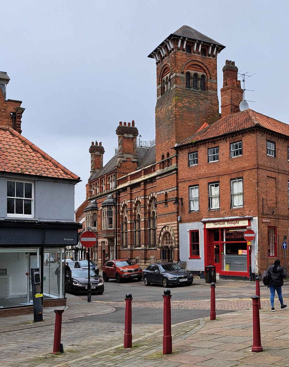 Newark-on-Trent has some eccentric buildings, like the Nottingham and Nottinghamshire Bank by Watson Fothergill (1887) incorporating a manager's house. In 1891 the manager defrauded the bank of £25,000 and drowned himself in the Trent. Now a school teaching the making of violins.