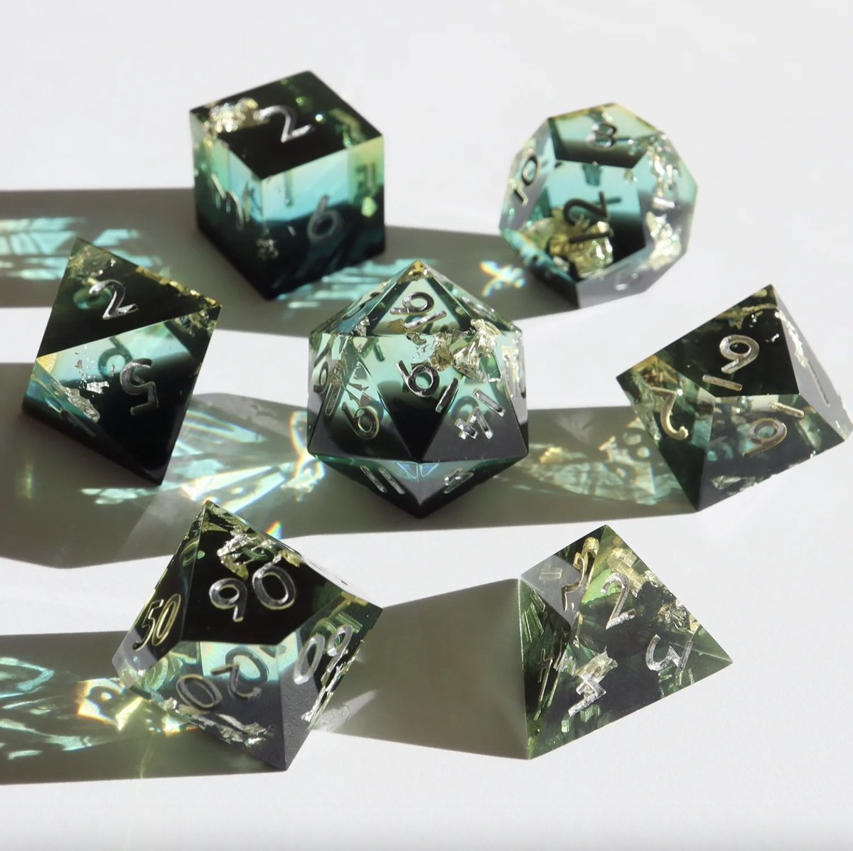 Giving some love to the off-colors and discounted sets, starting with Coldhearted! This batch got a little too much sun exposure, turning that cold heart a little warmer 💙 #dnd #dice #ttrpg