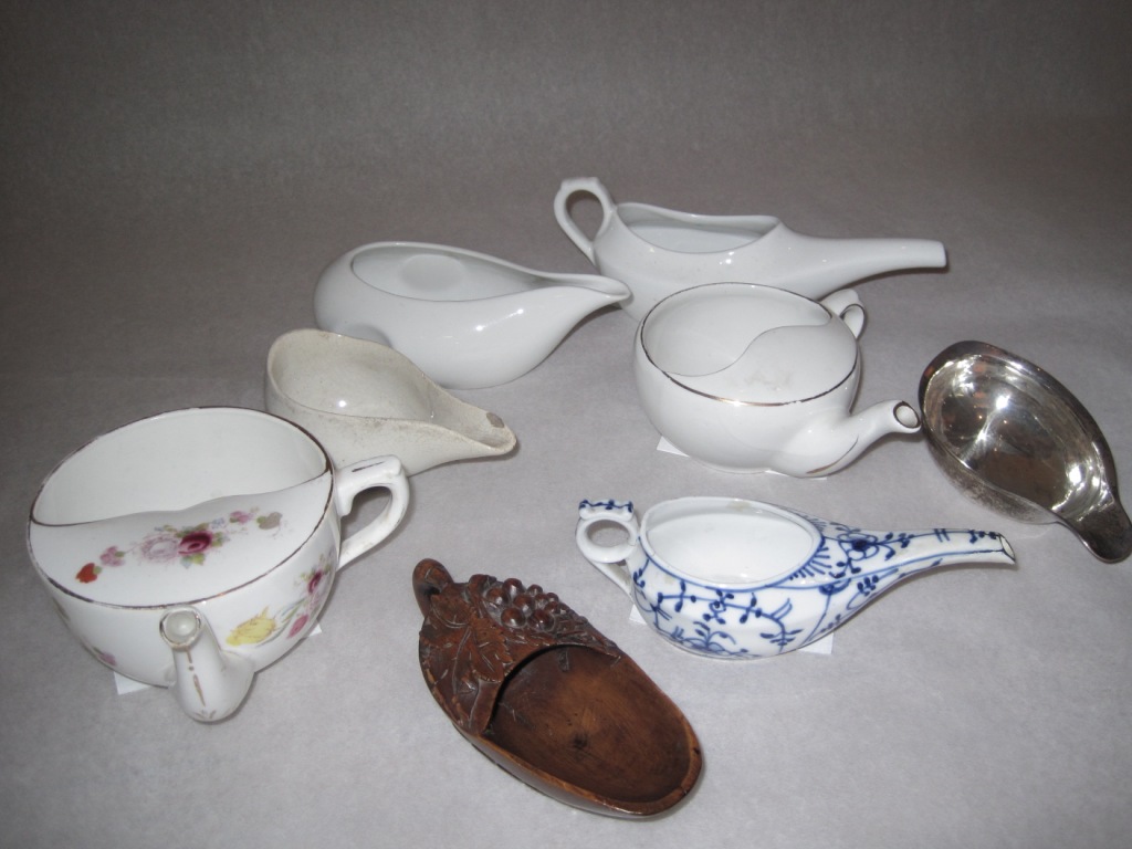 These feeding (pap) boats are part of our domestic collection. They resemble sauce or gravy boats, but instead of sauce, would be filled with a mixture of bread and milk or water to help to feed invalids. Some are prettier than others, and they come with or without handles.