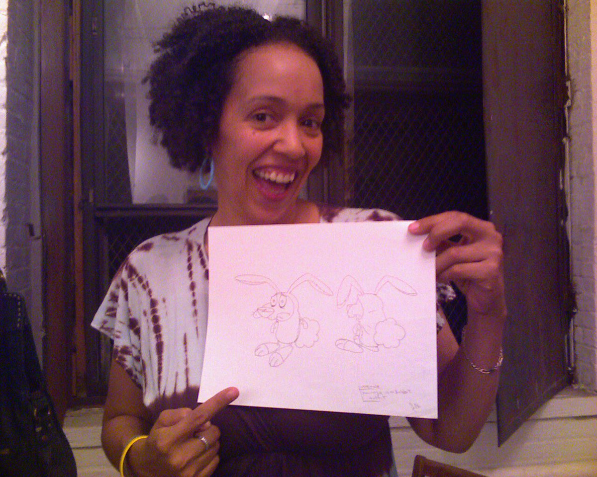 Me holding the actual design that I drew decades ago lol