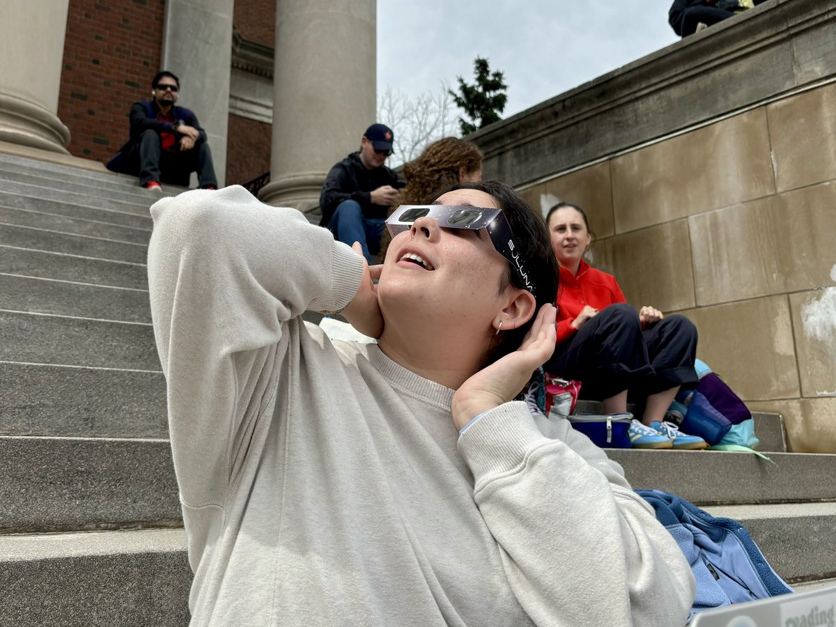 NewsHouse's tweet photo. Syracuse University students are gathering at the Shaw Quad for the #SolarEclipse2024. @SUArtSciences is hosting eclipse activities on the quad from 1:30-4 p.m. 🌘🔭 https://t.co/exeASJUNeY