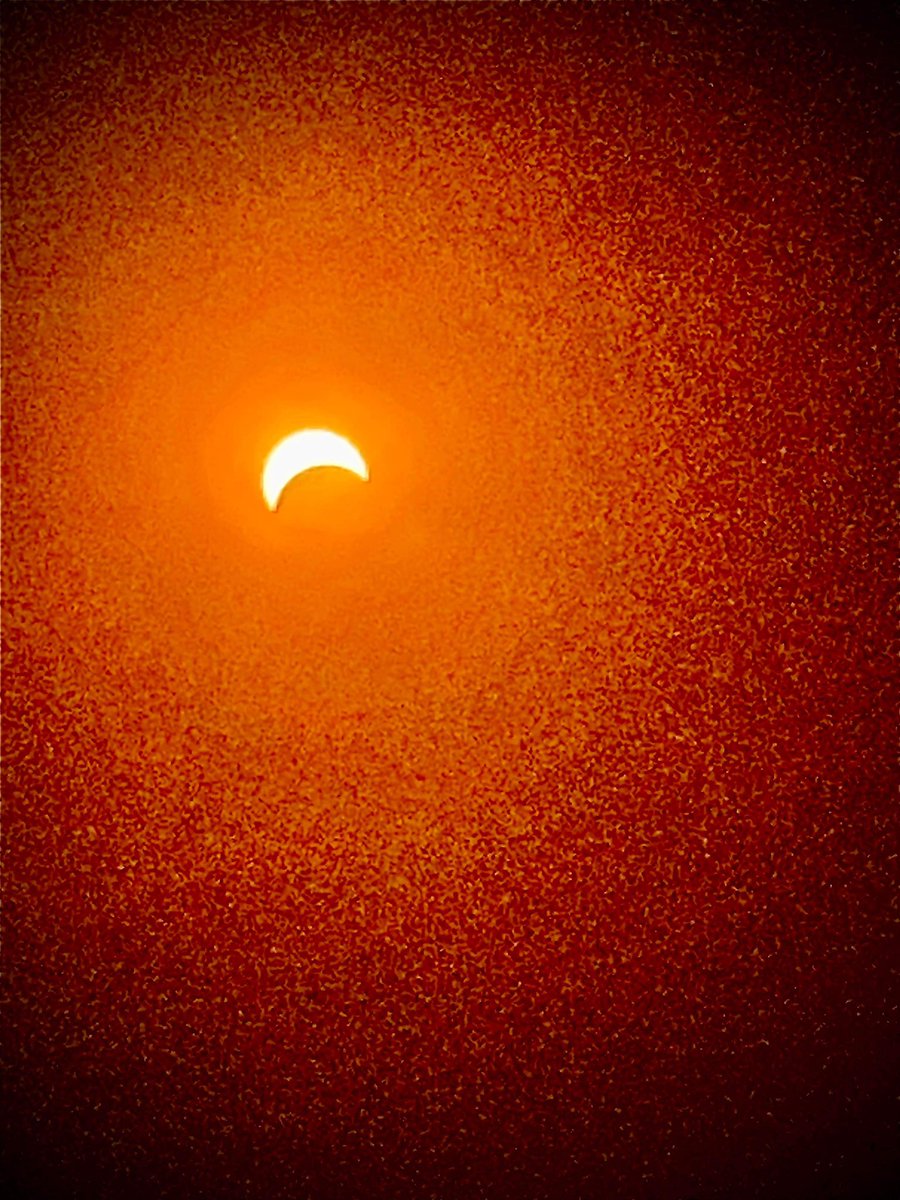 Solar eclipse 2024 captured by Senior Ranger Dan Walker at Greene Valley using an iPhone and a pair of eclipse glasses over the lens.