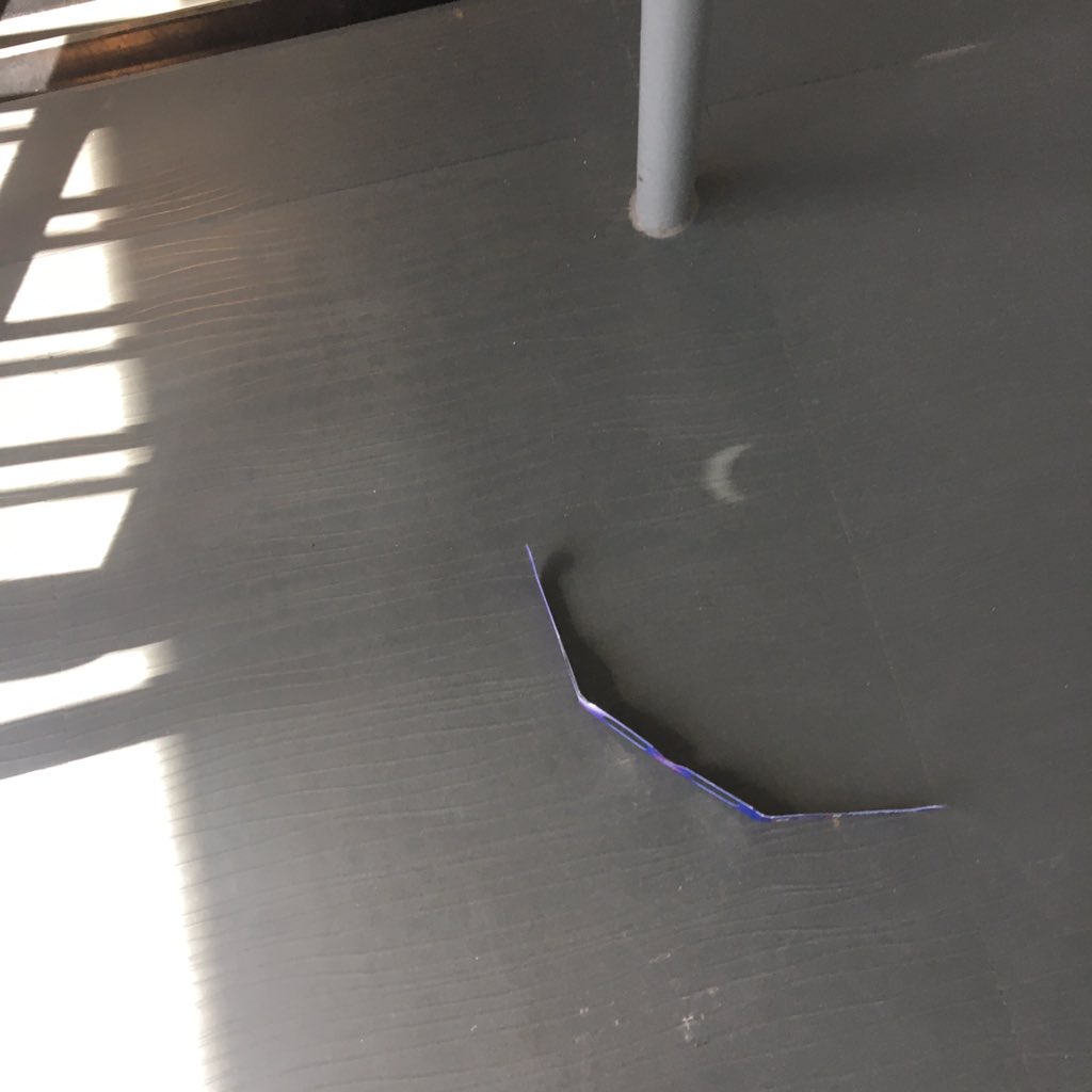 The stairwell in our school is acting as a pinhole viewer of the #Eclipse!