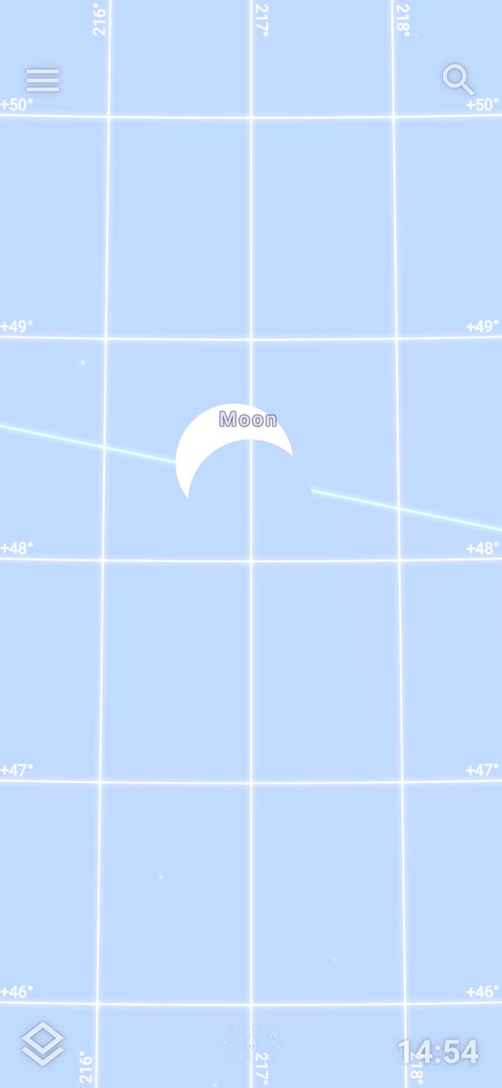 Apparently behind these clouds in Toronto by the lake, this is where the sun and moon are at. 2nd image is a screen shot from the Stellarium app. #SolarEclipse2024