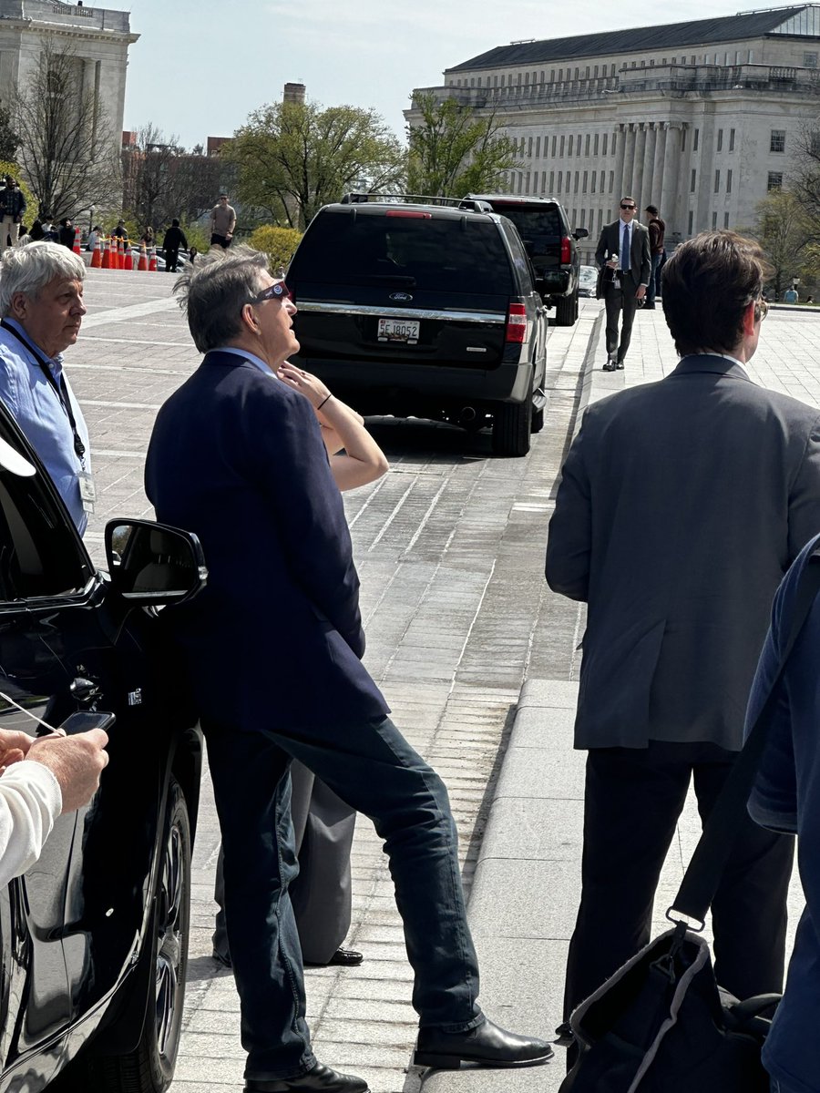 Senators watching the partial eclipse on the steps of the Capitol in DC @SenatorDurbin @Sen_JoeManchin