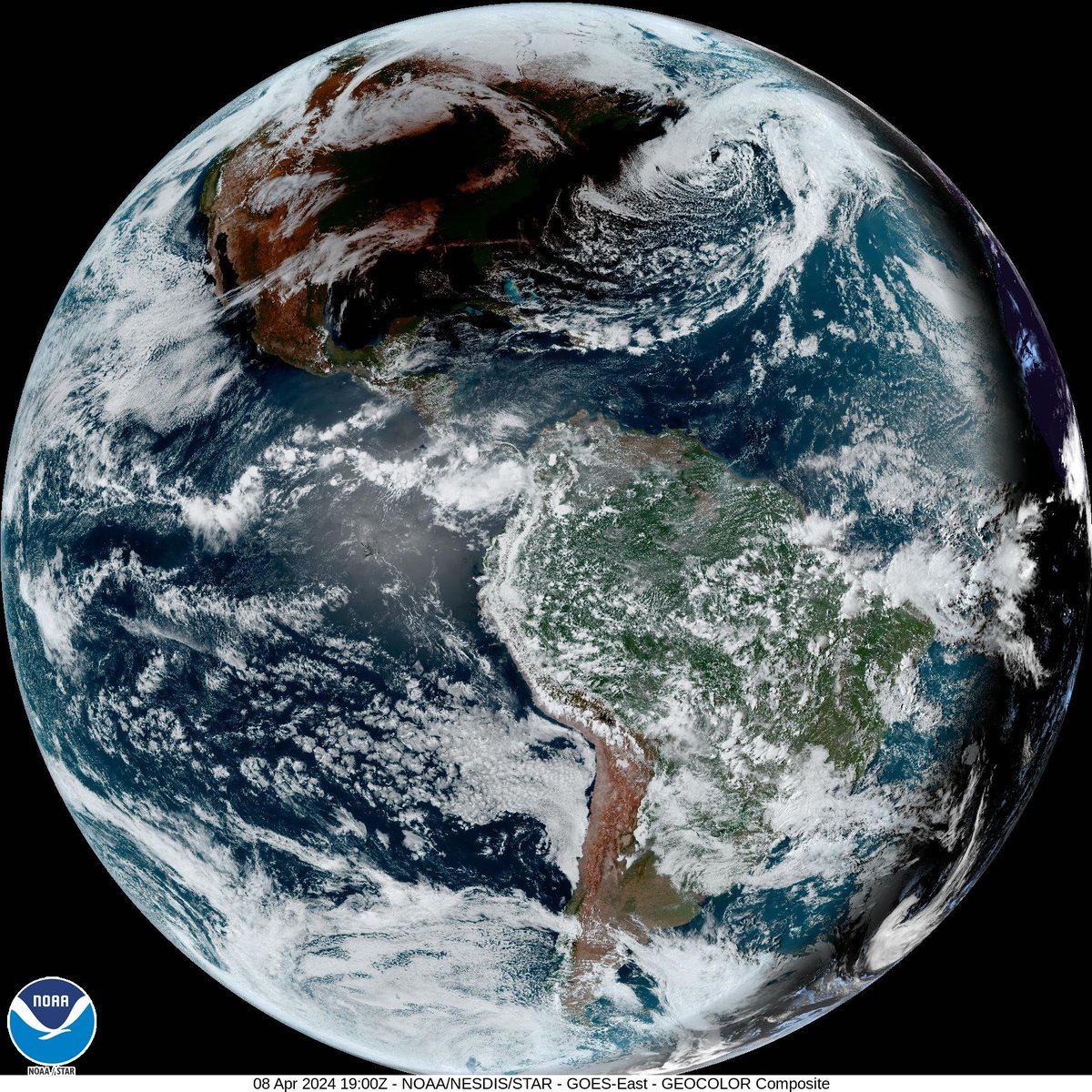 the solar eclipse over North America as seen by NOAA's GOES satellite. Simply stunning! nhc.noaa.gov/satellite.php