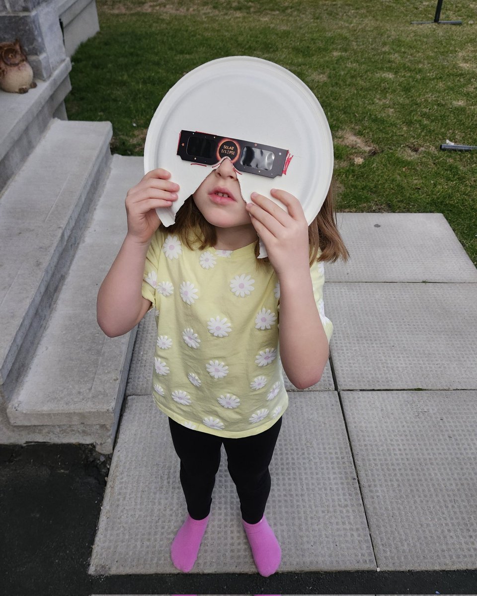 Solar Eclipse day. Making sure she can't take any extra peeks without the glasses! @MrsHicksRECE