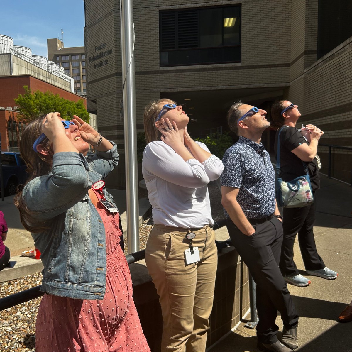 Dr. Joseph Neimat & the #UofLNeurosurgery administrative staff checking out today's #SolarEclipse. It was such a cool experience! #Eclipse2024