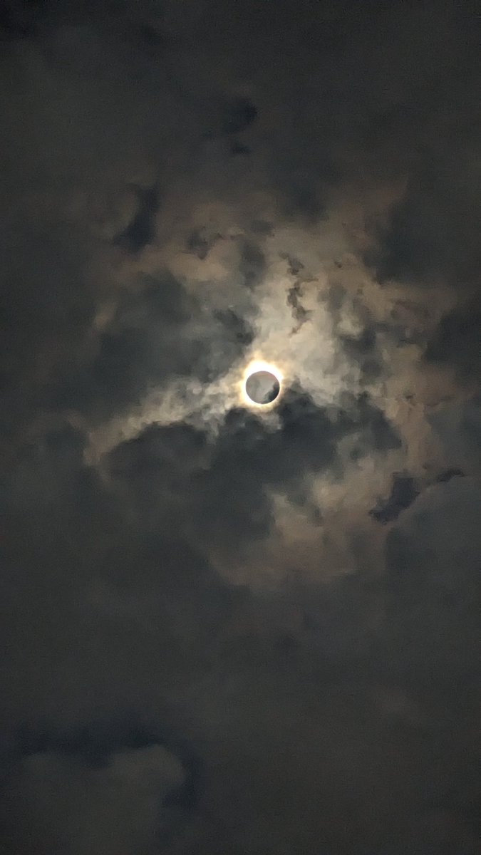 A bit of cloud cover, but still got a good view of the eclipse at my parents house in Hamilton, Ontario.