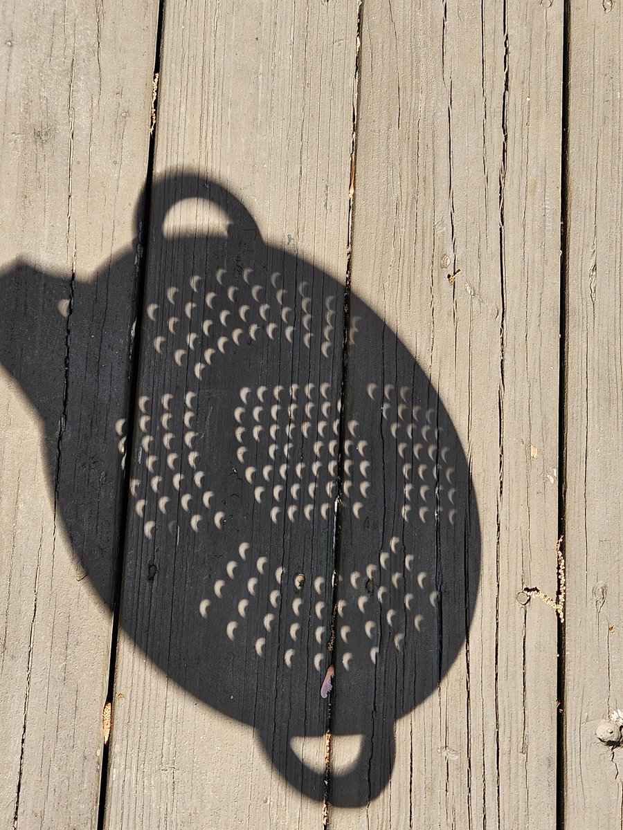 Imagine, if you will, a celestial dance orchestrated in the heavens, where the moon pirouettes across the sun. 😍Seriously, what could be more delightful than to witness this cosmic ballet through the humble holes of a colander?

 #Eclipse2024 #SolarEclipse #KitchenGadgets