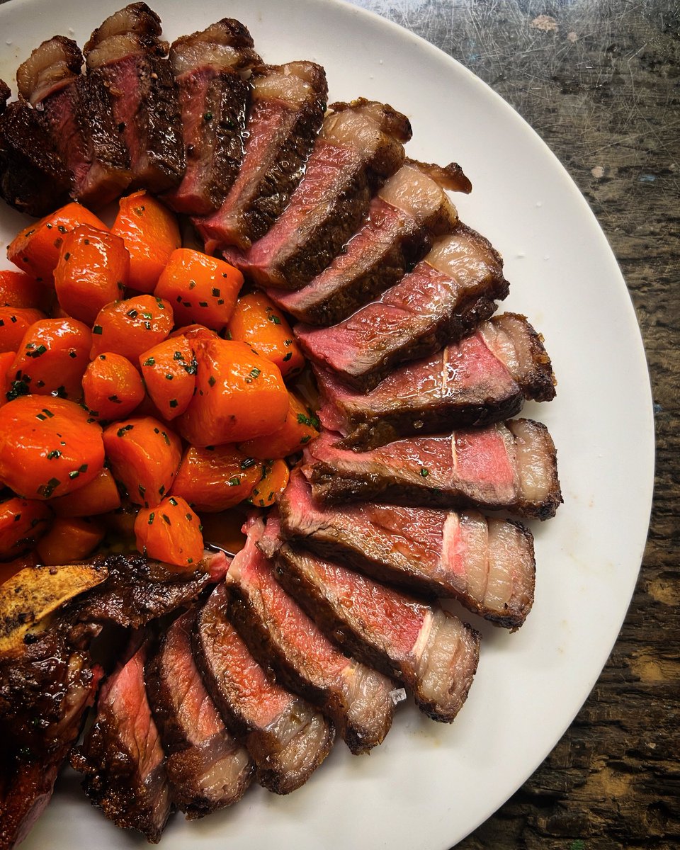 Now that’s how you start your week off right. 19oz 35 day aged sirloin of beef served with red wine sauce, roasted carrots with smoked garlic honey and our famous truffle & Parmesan chips just out of shot.