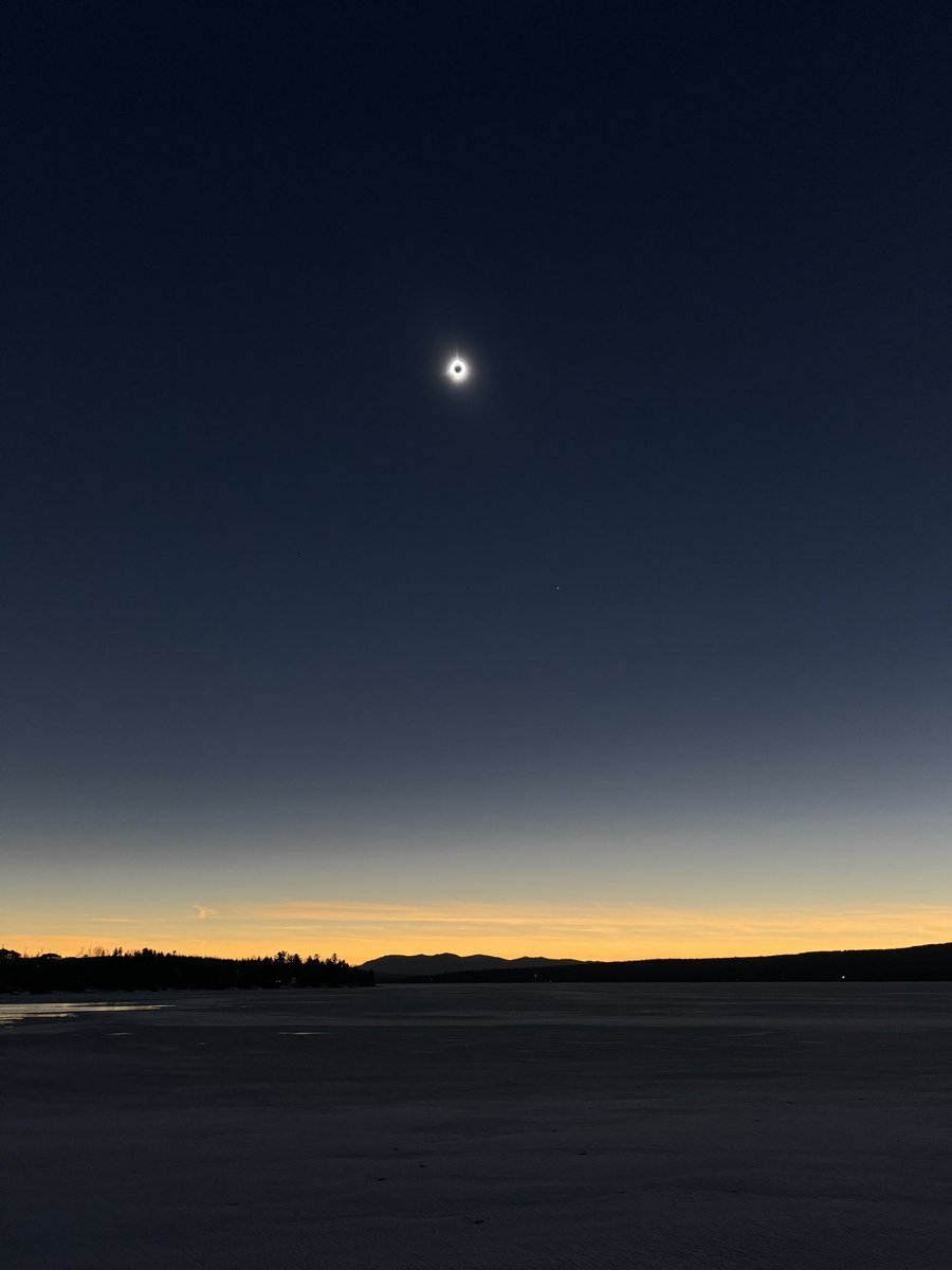 Total eclipse over a frozen lake in Quebec. One of the coolest moments of my entire life