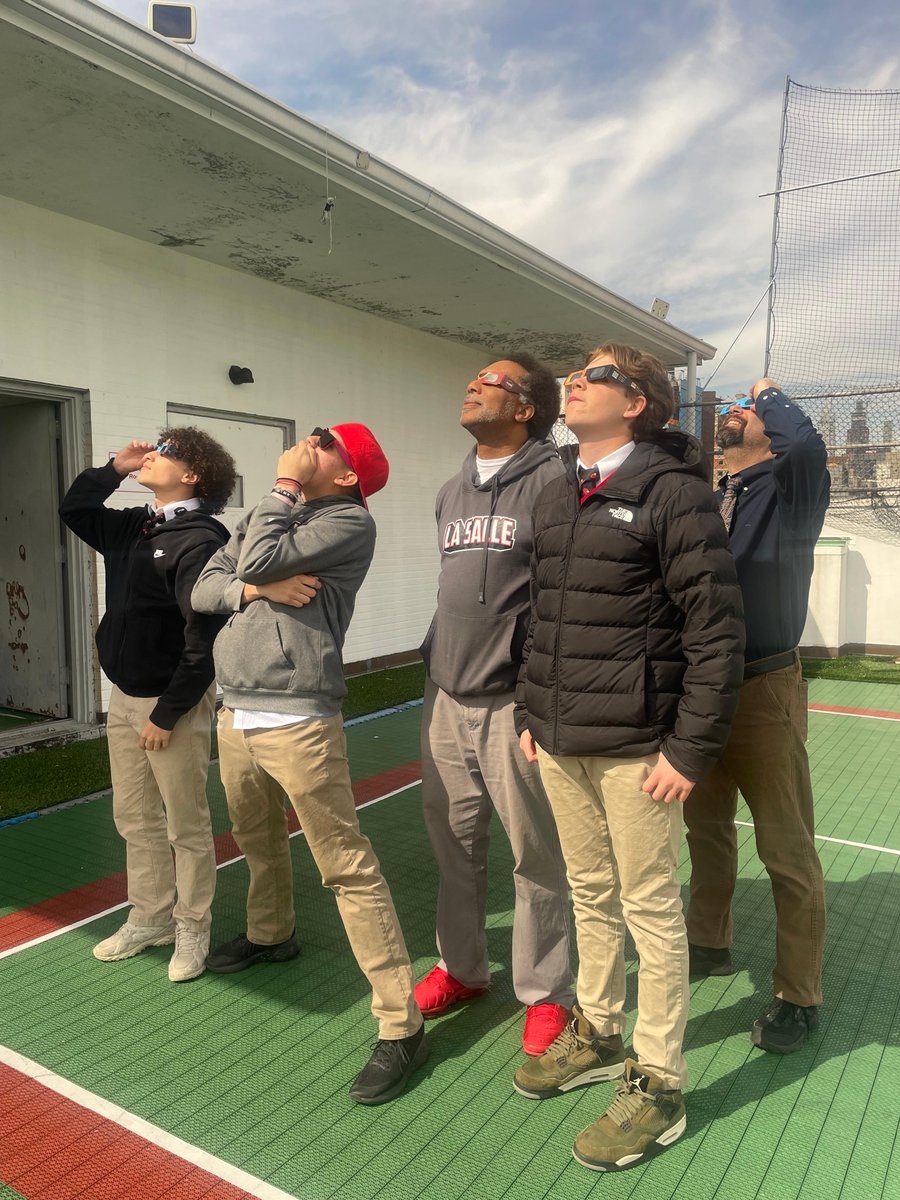 Eyes on the skies: Captivated Cardinals marvel at the breathtaking solar eclipse spectacle 🌞🌑 #SolarEclipse #NYCSchools