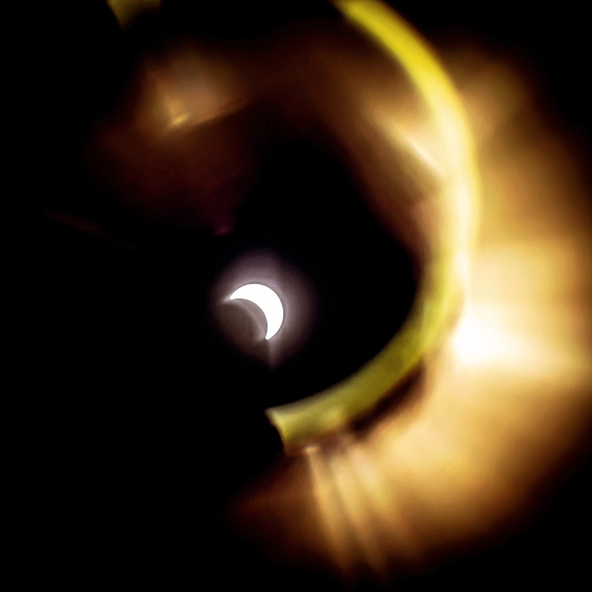 Couldn't make it to the path of totality this time due to a trip coming up in a few days, but caught what I could from CO with two opposing ND filters on a lens they didn't fit on...led to a pretty cool effect!