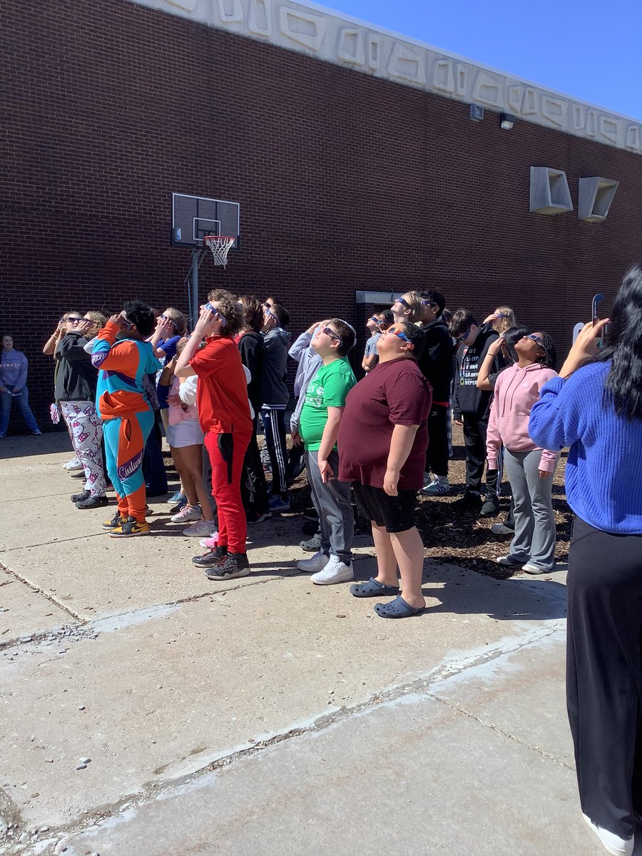FLWWILDCATS's tweet photo. Eclipse 2024 at FLW!  A TOTAL Eclipse of the Heart shout out to our Frank Lloyd Wright PTA and a one of our families who arranged for all our students to have eclipse viewing glasses!  🐯🖤💛🌕🌖🌗🌑🌓🌔 #flwwildcats #wildcatwow #wawmproud #TheWestWay #eclipse2024 #EclipseViewing https://t.co/nuoAmYDne5