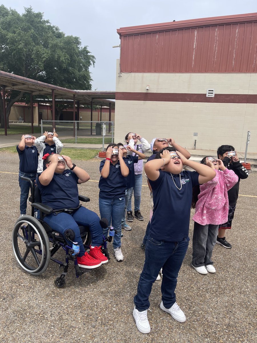 Watching history unfold! 😎 Students from across our district gaze in awe as they witness the breathtaking sight of the Solar Eclipse today! 🌞🌑 #PSJAFamily #SolarEclipse24