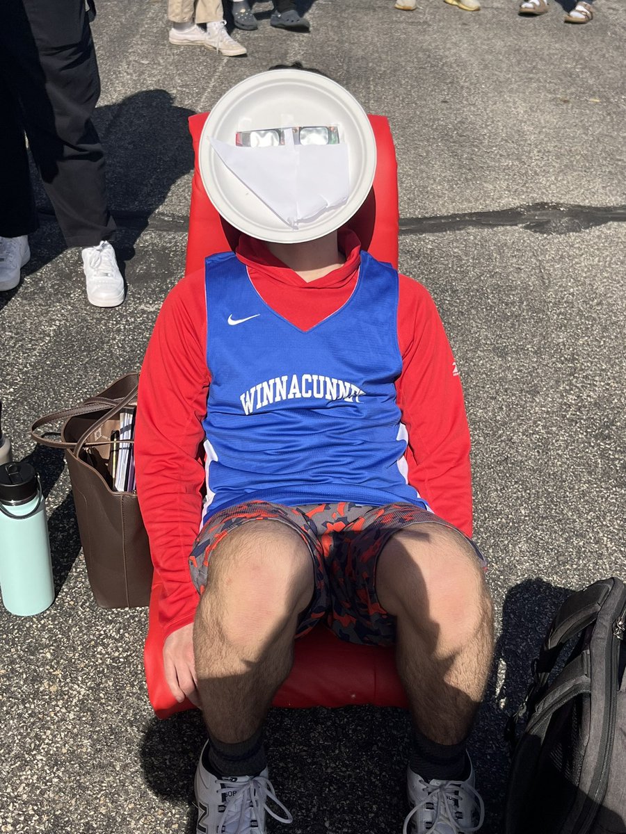 Taking a break from Unified Track Practice to stare at the sun.