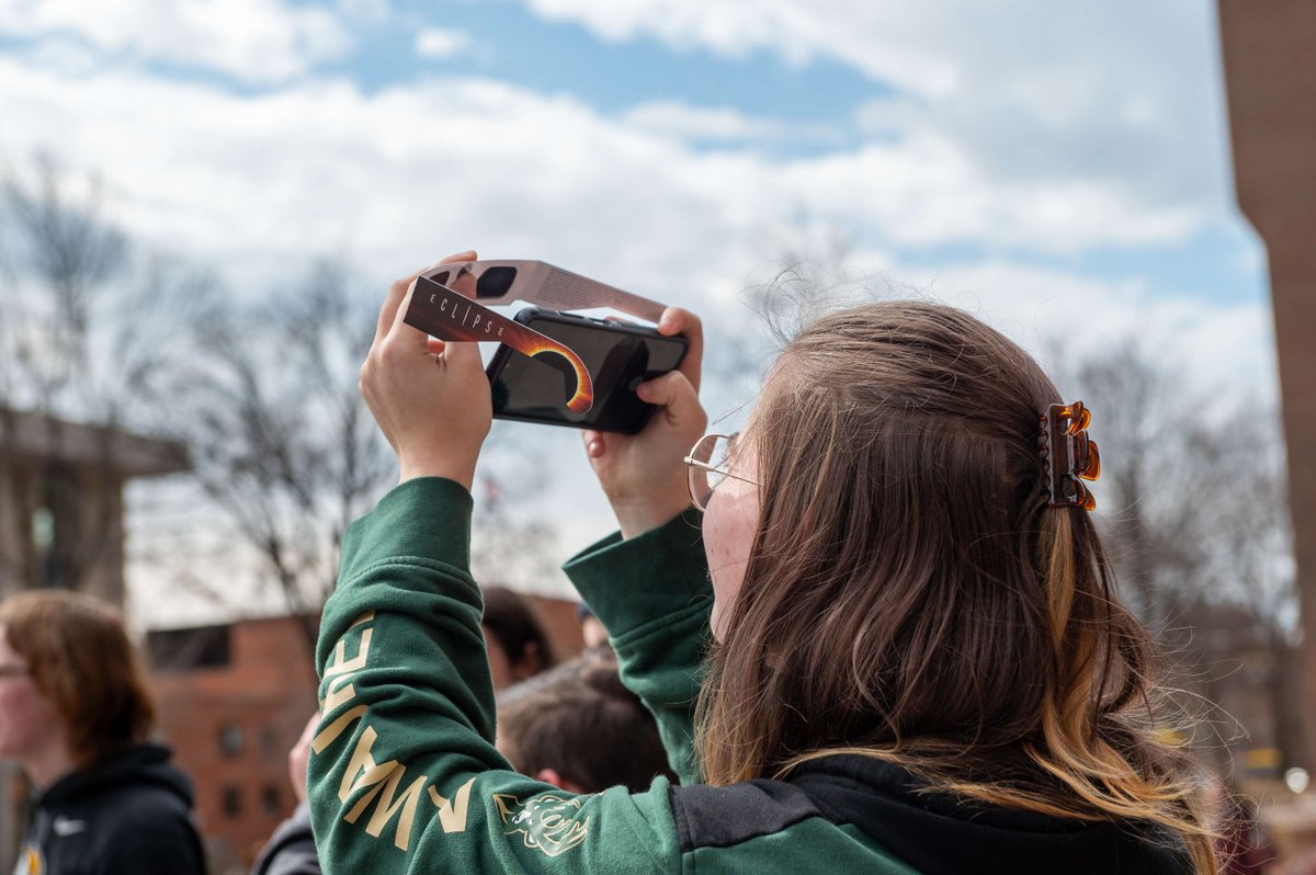 Mother Nature loves a little suspense – as Huskies counted down solar eclipse viewing time, excitement on campus grew. Finally, the cloud curtain parted to unveil a breathtaking spectacle. Totally worth the wait. 😎🌝 #MichiganTech #SolarEclipse