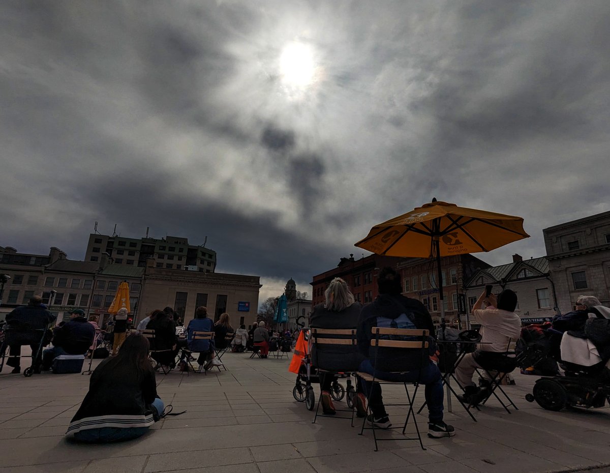 What a strange feeling to look up in the sky, midday, in near-darkness, and see a shimmering ring there instead of the sun. In Kingston we were lucky to have a view of the solar corona at totality for about 3 mins, even through some thin clouds. Spectacular! #ygk #VisitKingston