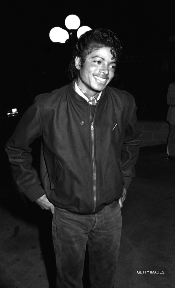 Michael just being casually cool in Los Angeles, photographed at Liza Minnelli concert after party held this week in 1983.