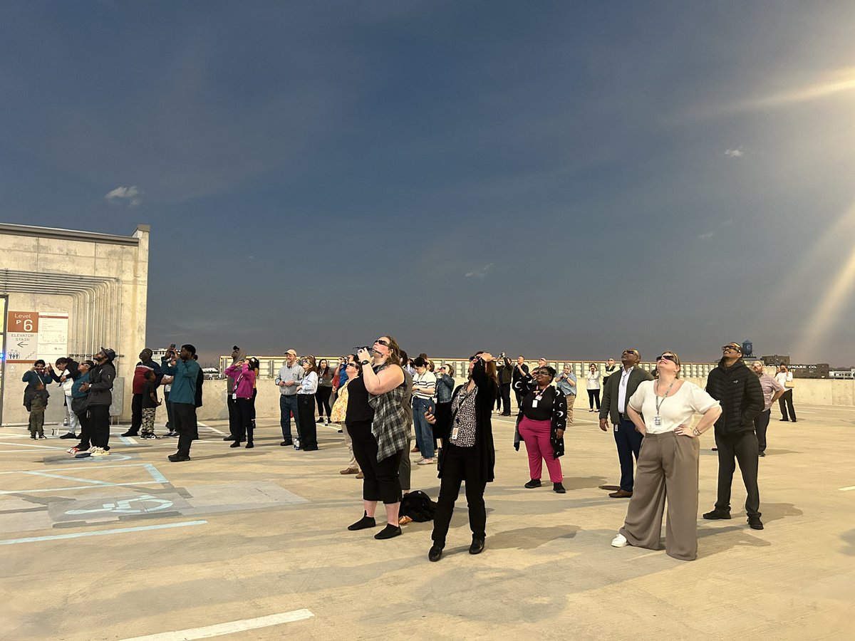 cbusconventions's tweet photo. #SolarEclipse festivities. Our team joined together for the solar eclipse on our Ohio Center Garage rooftop. 🌕

#WorkAtGCCC #ASMGlobal https://t.co/yiglfIqJkK