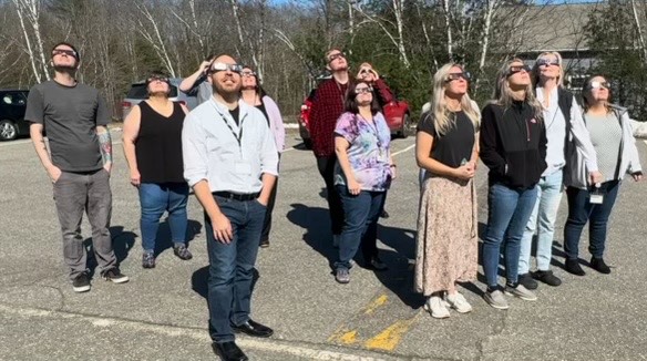 Sweetser staff taking a moment to experience the Solar Eclipse! #Eclipse2024 🌑