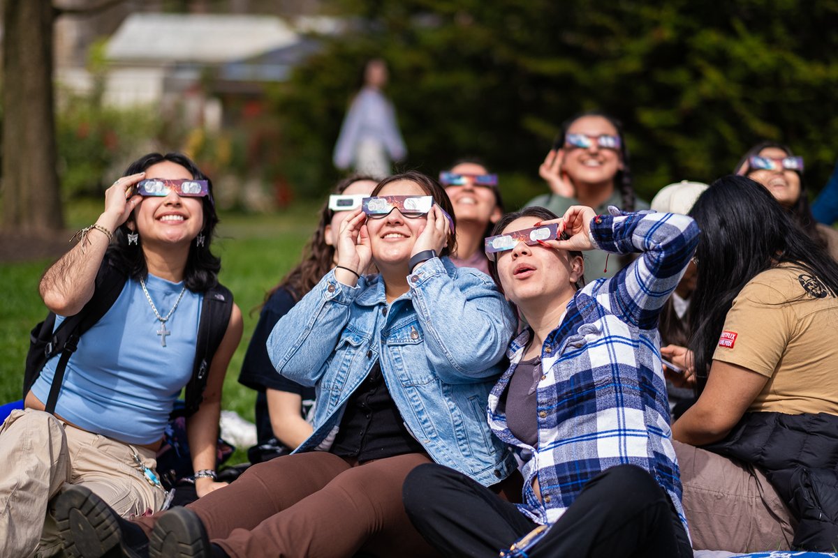 Cloudy skies couldn't ruin the fun! #eclipse🌥️☀️🌒🕶️ #eclipse #brynmawrcollege