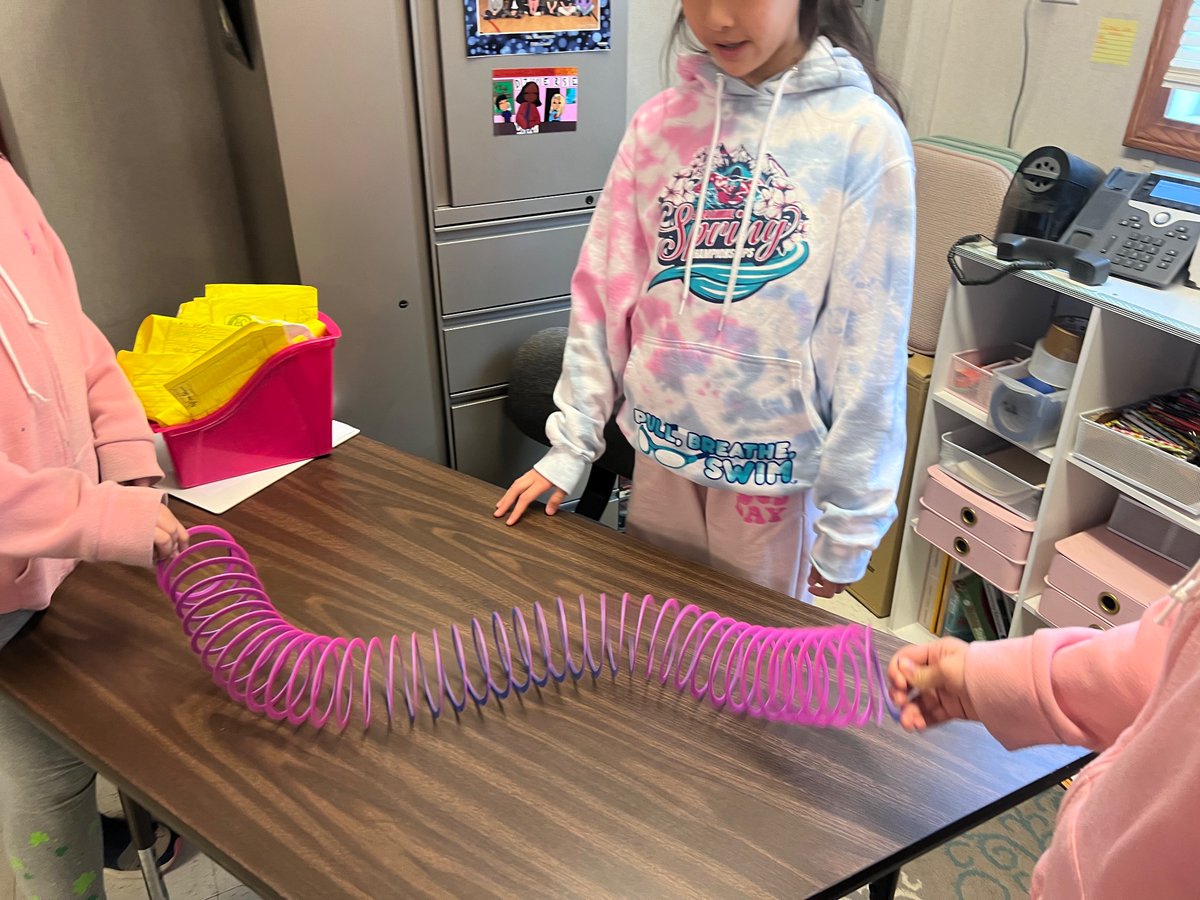 MsFearrington's tweet photo. Today in science we learned how light waves move using slinkies! How many different types of light waves can you name? https://t.co/yvT19QAYxd